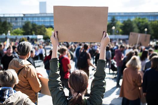 Rear view of people with placards and posters on global strike 